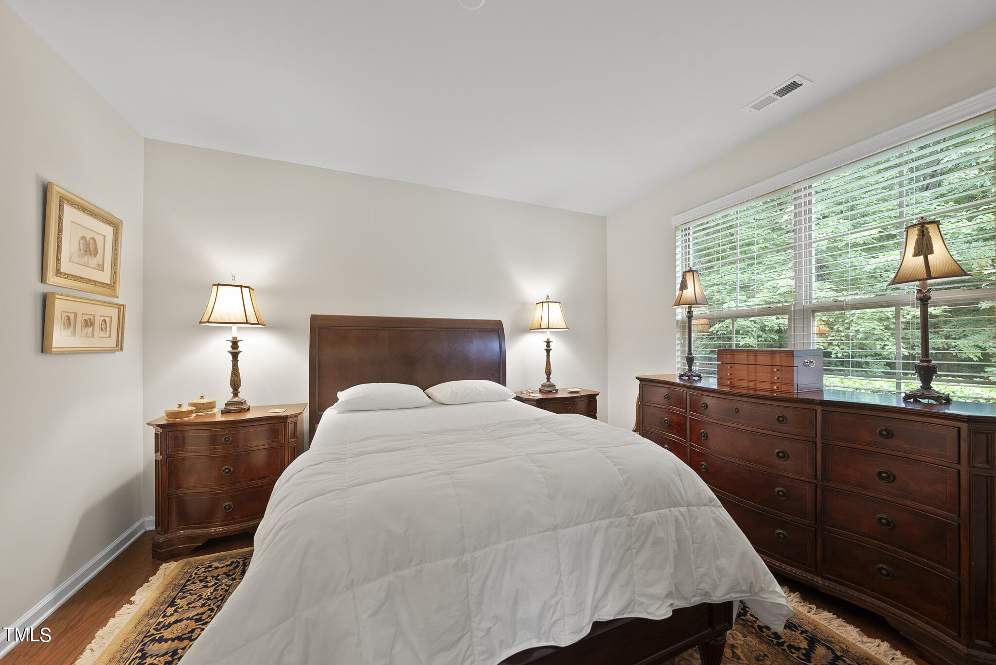 2 Intuition Circle Durham, NC 27705 - Photo 20 of 33 a bedroom with a bed and a window