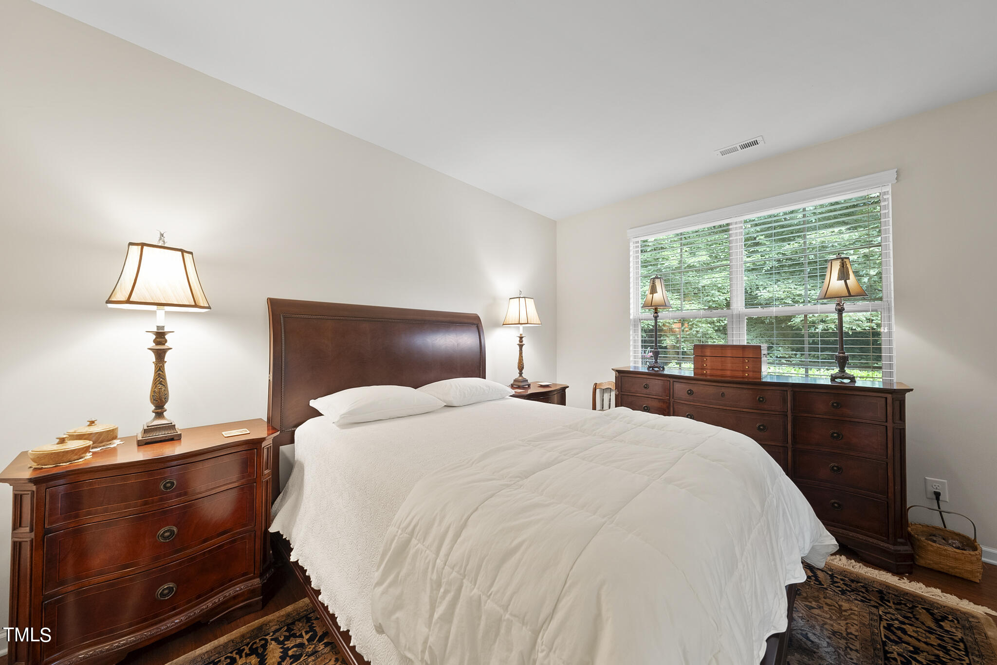 2 Intuition Circle Durham, NC 27705 - Photo 21 of 33 a bedroom with a bed and a lamp next to a window