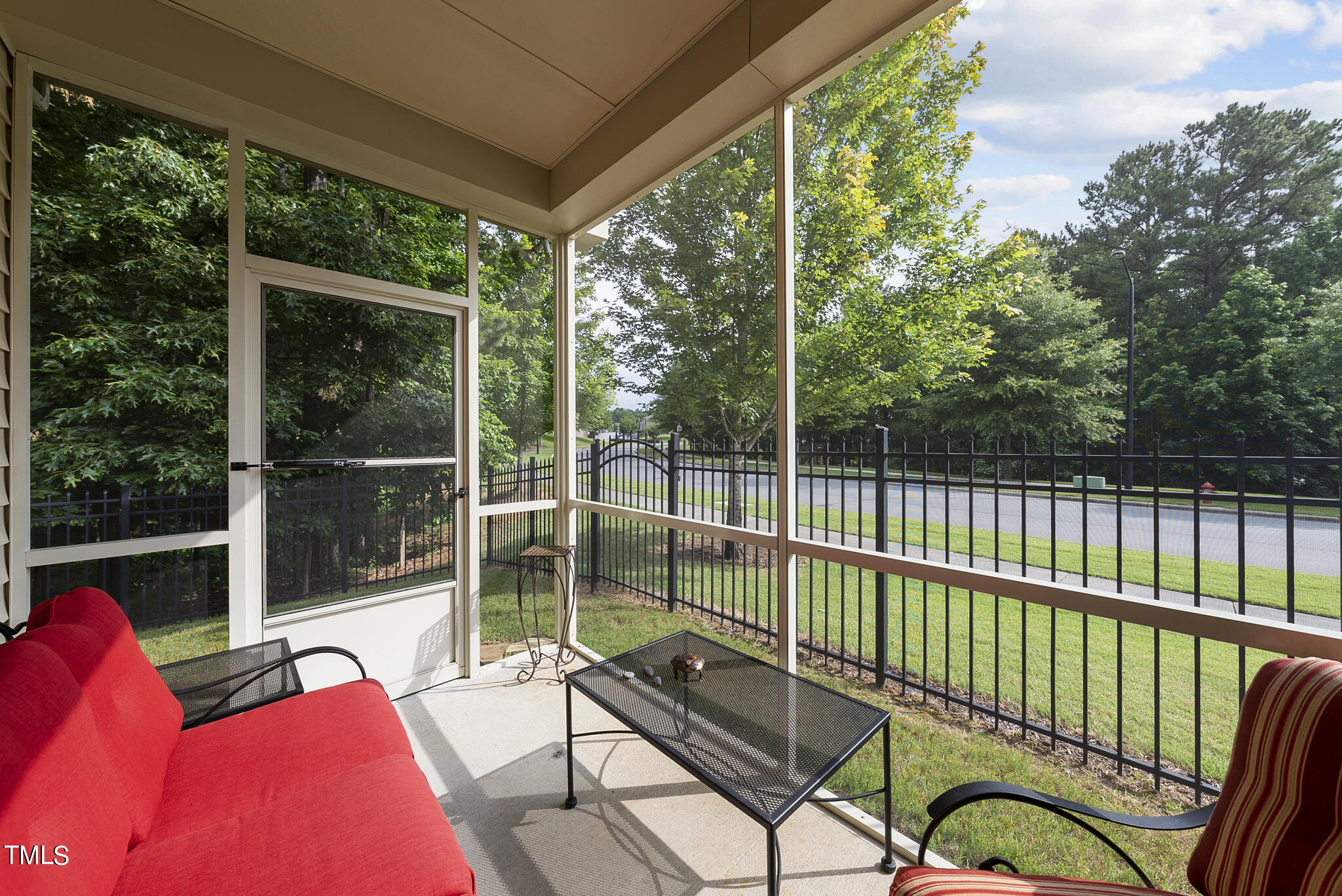2 Intuition Circle Durham, NC 27705 - Photo 23 of 33 a view of a deck with a floor to ceiling window and wooden fence