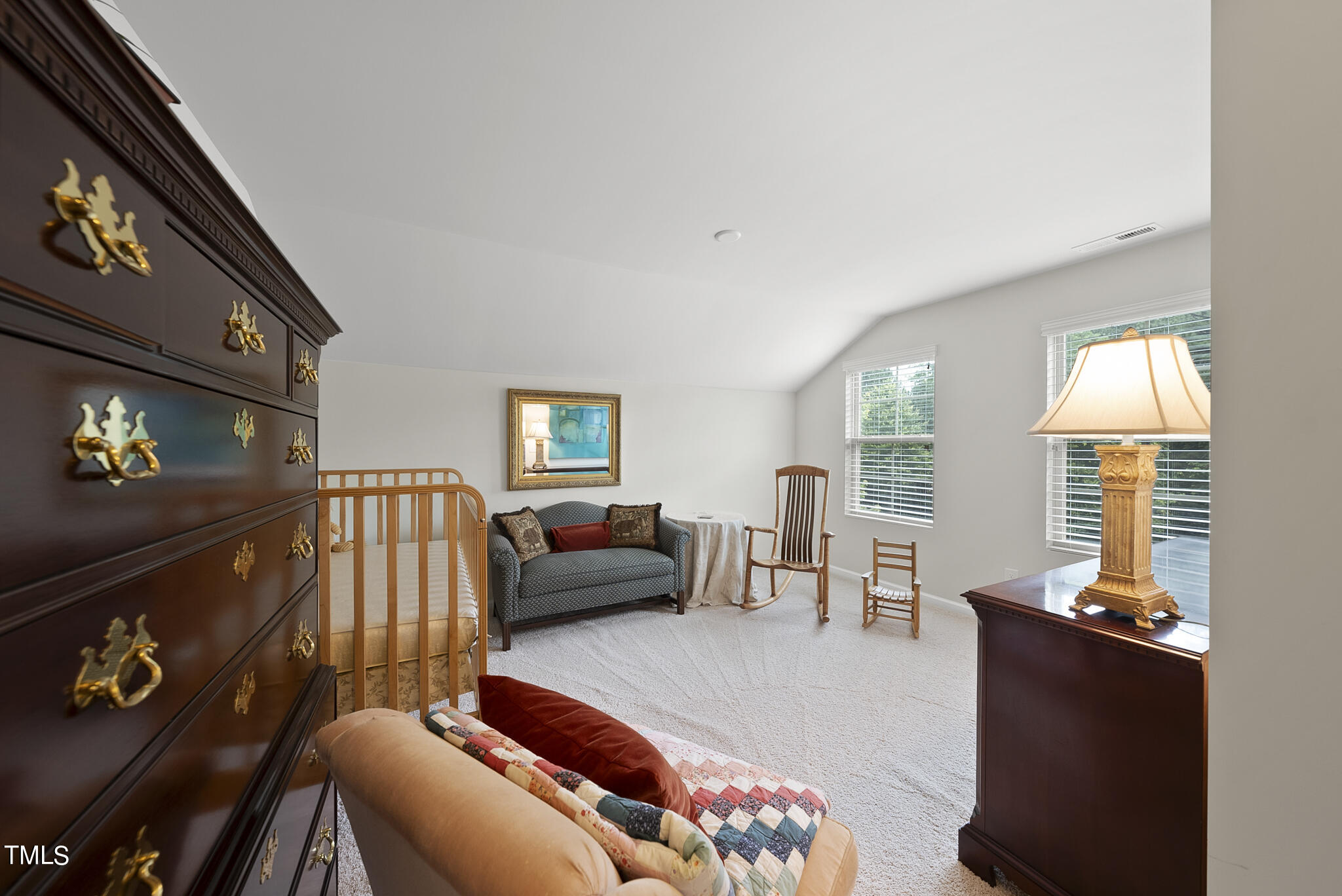 2 Intuition Circle Durham, NC 27705 - Photo 25 of 33 a living room with furniture and a flat screen tv