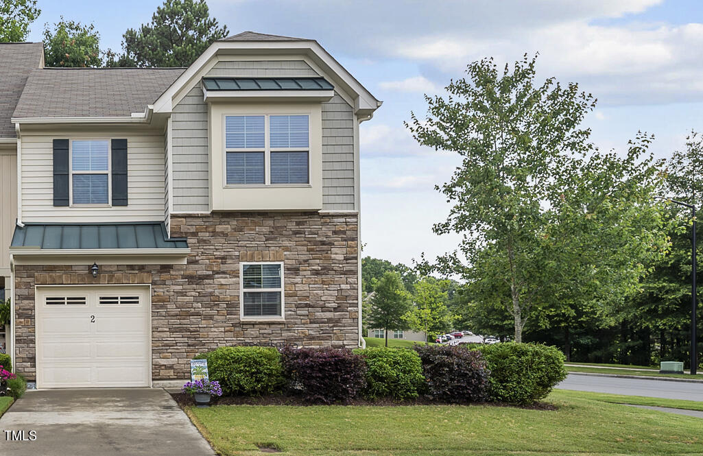 2 Intuition Circle Durham, NC 27705 - Photo 4 of 33 a front view of a house with garden