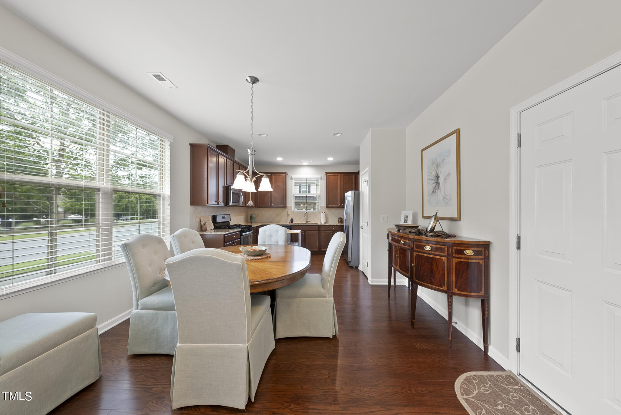 2 Intuition Circle Durham, NC 27705 - Photo 6 of 33 a view of a dining room with furniture window and wooden floor