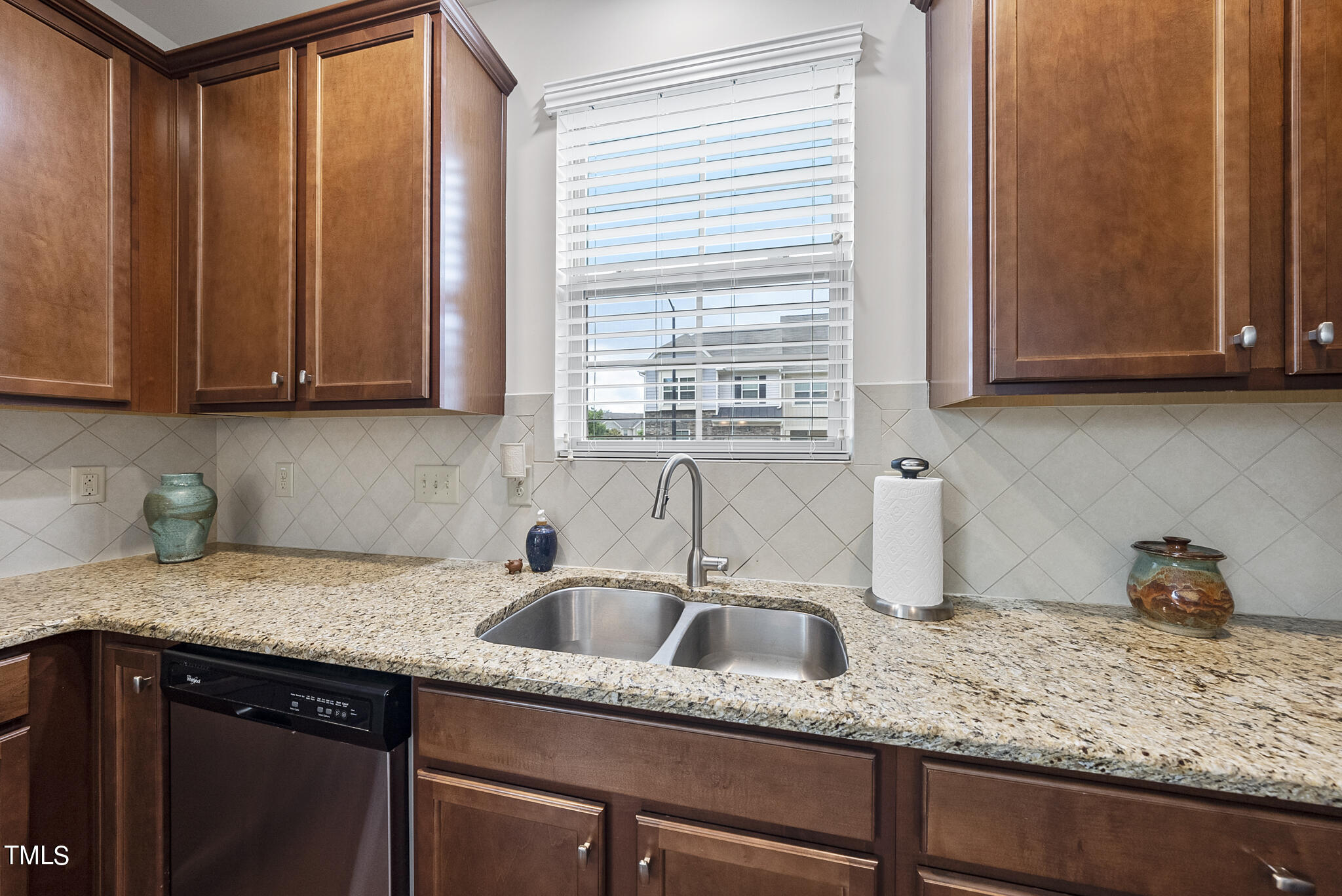 2 Intuition Circle Durham, NC 27705 - Photo 9 of 33 a kitchen with granite countertop cabinets sink and window