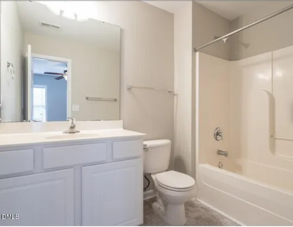 a bathroom with a sink a toilet and a bathtub