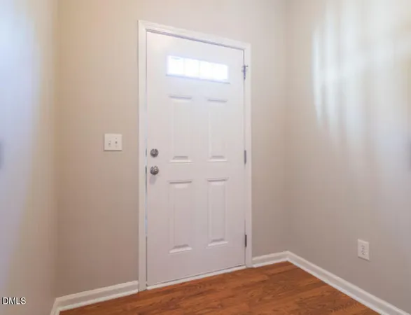 a view of small space with wooden floor