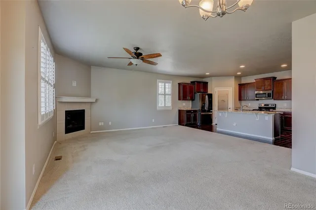 a view of a kitchen with furniture and a kitchen
