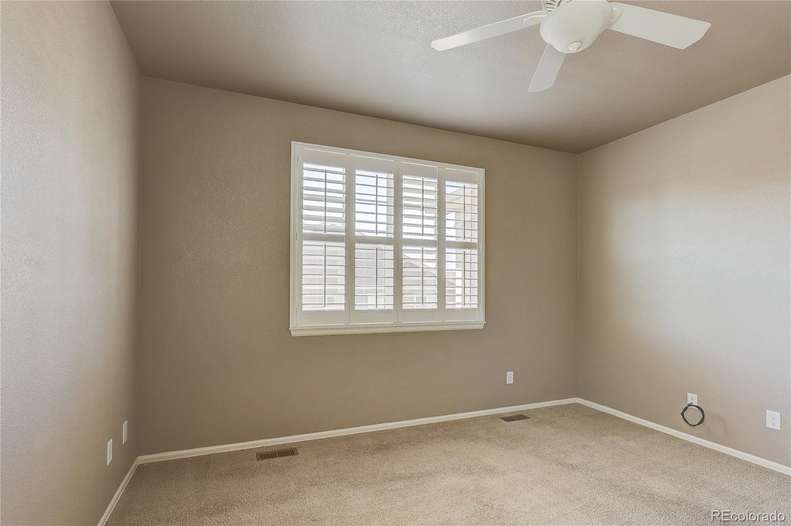 8891 Foxfire Street Firestone, CO 80504 - Photo 22 of 37 an empty room with a window
