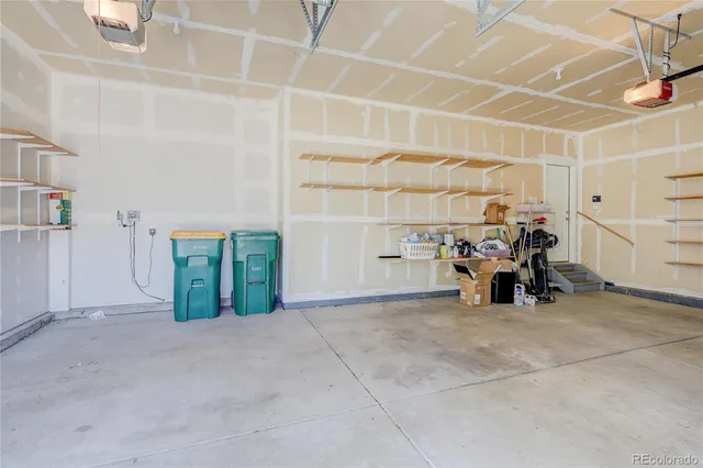 a view of a garage with storage