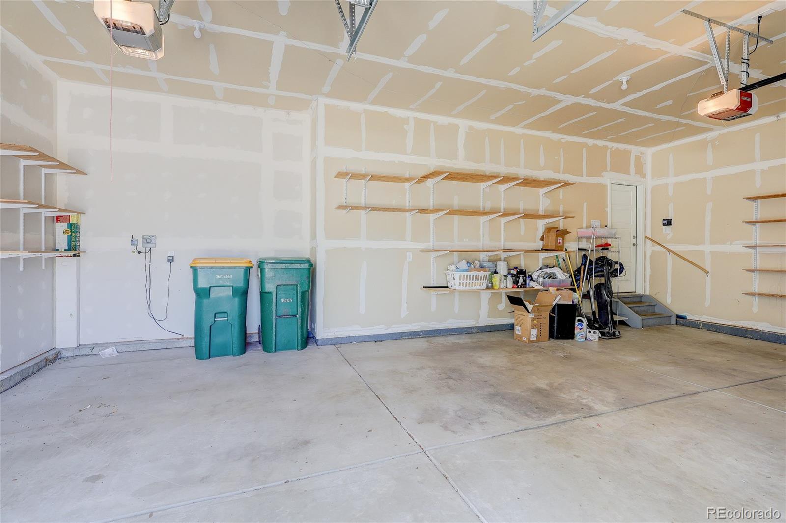 8891 Foxfire Street Firestone, CO 80504 - Photo 27 of 37 a view of a garage with storage