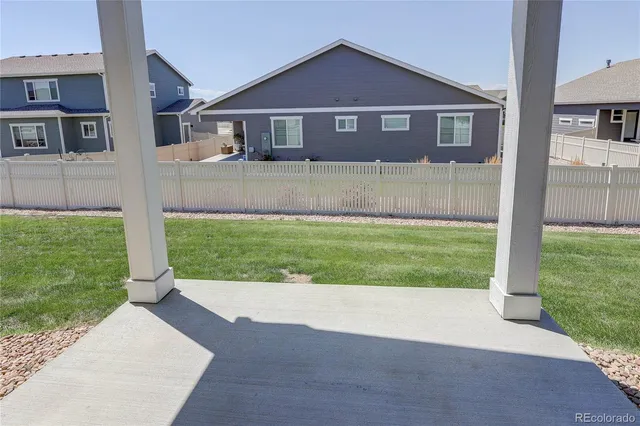 a front view of a house with yard