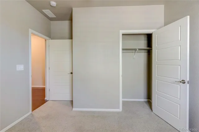 wooden floor and closet in an empty room