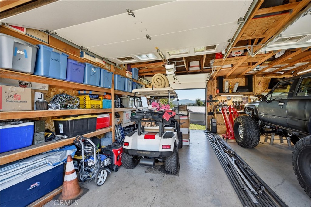 20257 Indian Rock Road Hidden Valley Lake, CA 95467 - Photo 23 of 33 Garage has door to rear of property, for drive through convenience.