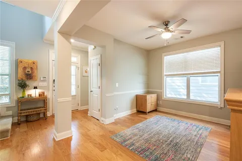 a large kitchen with stainless steel appliances granite countertop a stove and a sink