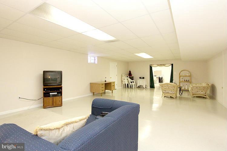 15619 Thompson Road Silver Spring, MD 20905 - Photo 22 of 27 EXTRA LARGE Rec Room or In-law Suite