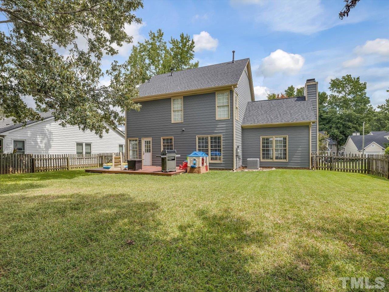11220 North Radner Way Raleigh, NC 27613 - Photo 13 of 24 a front view of house with outdoor space and garden