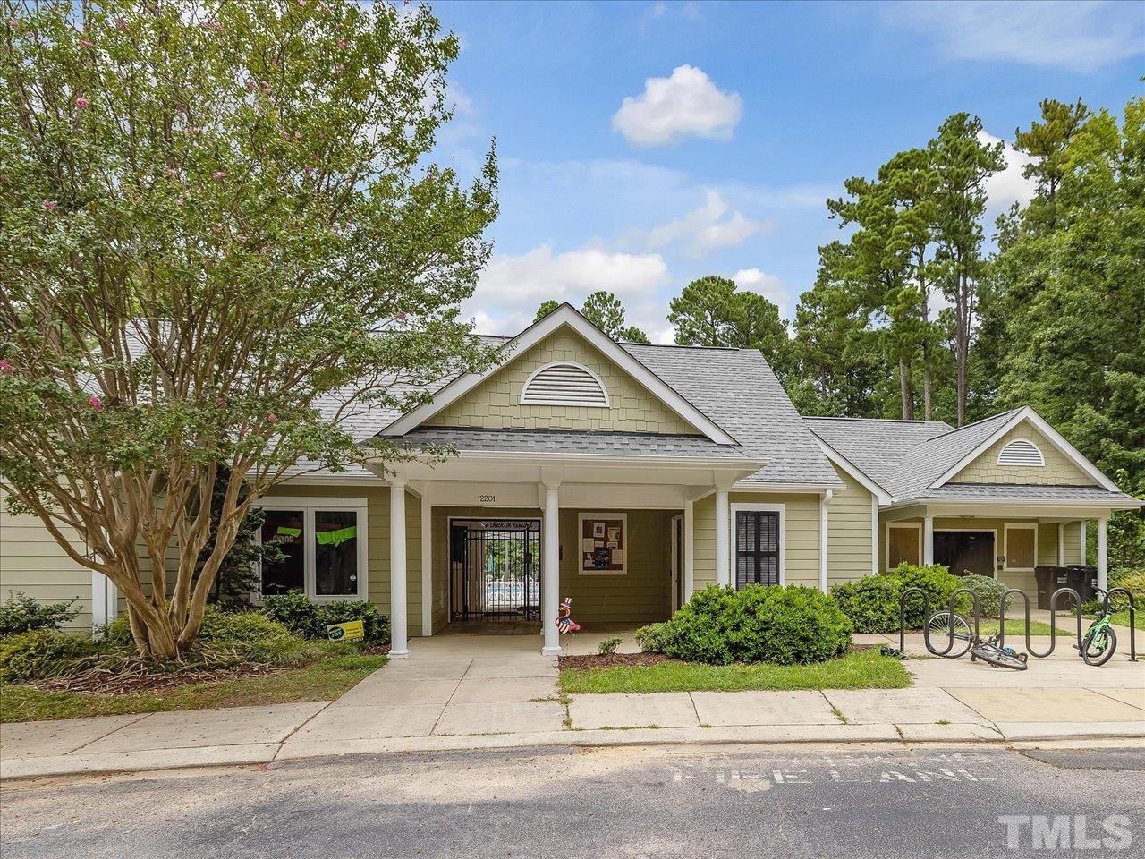 11220 North Radner Way Raleigh, NC 27613 - Photo 22 of 24 front view of a house with a yard