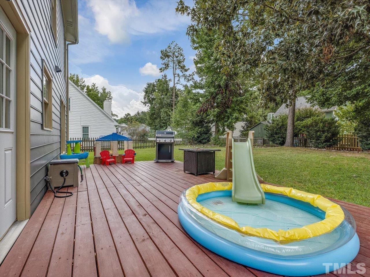 11220 North Radner Way Raleigh, NC 27613 - Photo 10 of 24 a view of a swimming pool with a patio