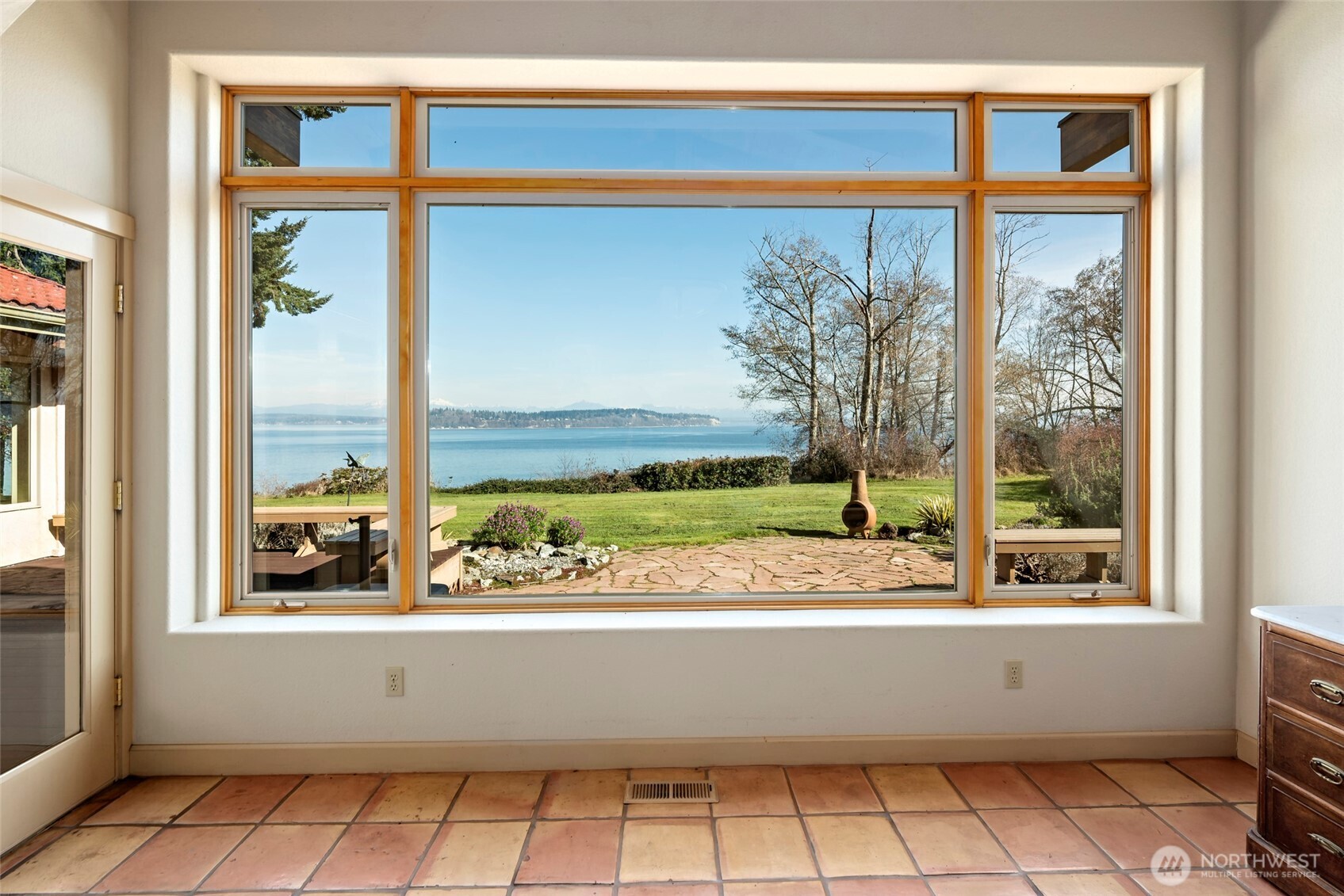 5477 Wilkinson Road Langley, WA 98260 - Photo 12 of 40 a view of a room that has a bed and a window