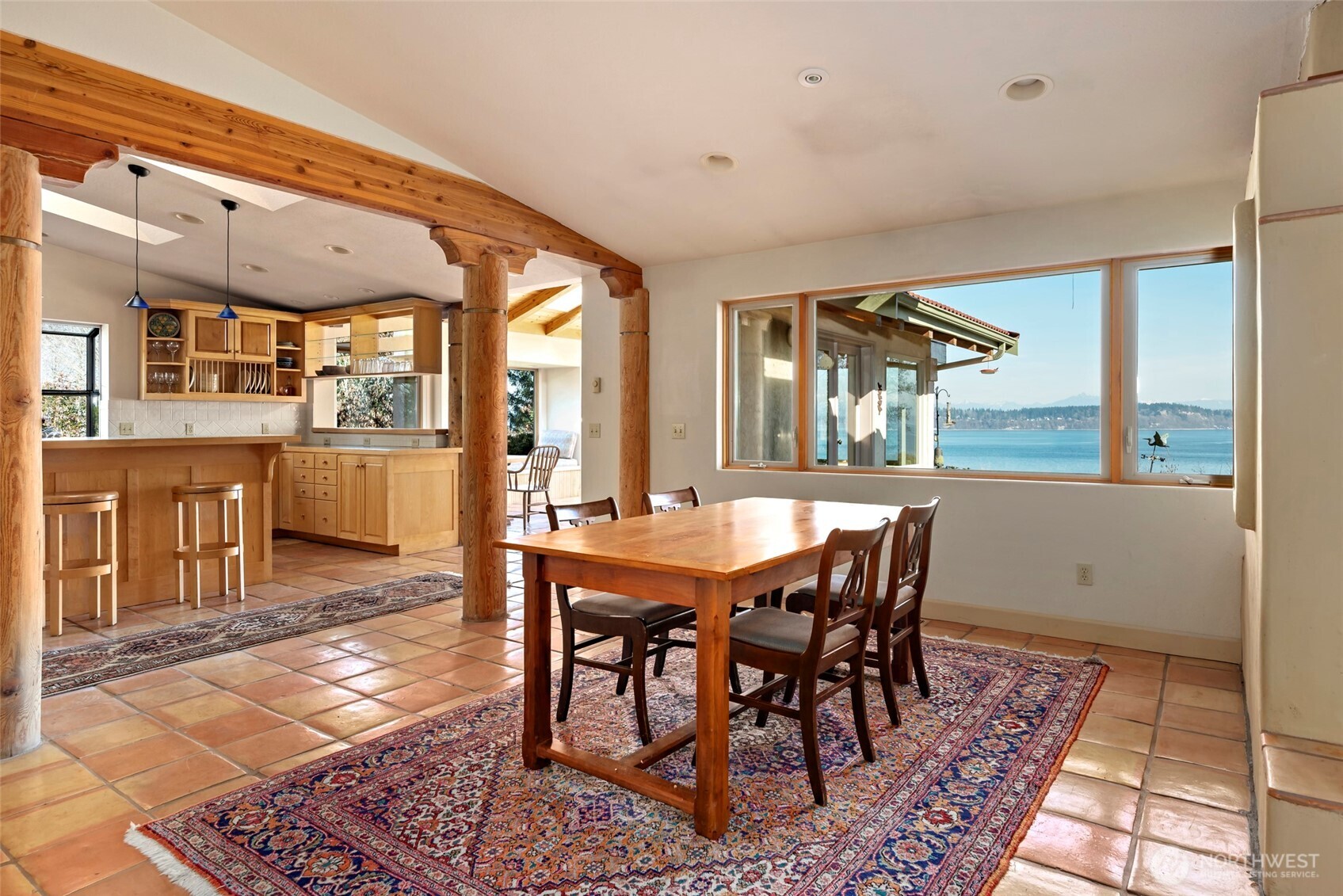5477 Wilkinson Road Langley, WA 98260 - Photo 14 of 40 a view of a dining room with furniture