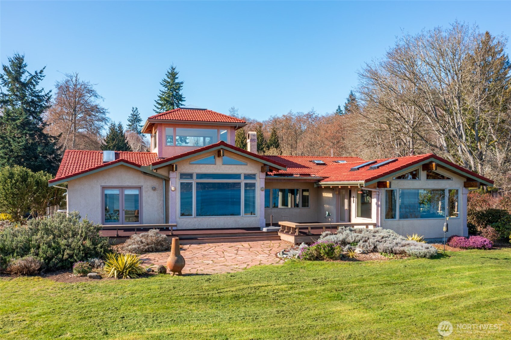 5477 Wilkinson Road Langley, WA 98260 - Photo 2 of 40 a front view of a house with a yard