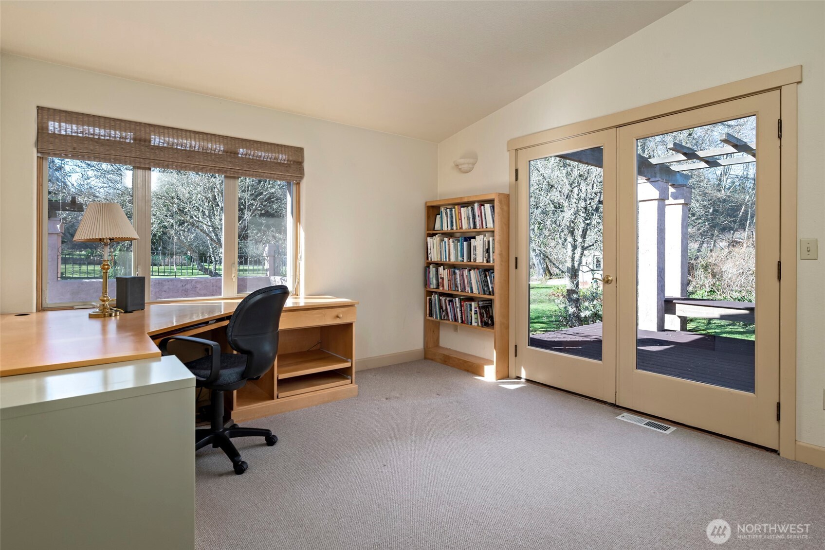 5477 Wilkinson Road Langley, WA 98260 - Photo 24 of 40 a view of a livingroom with furniture and a large window
