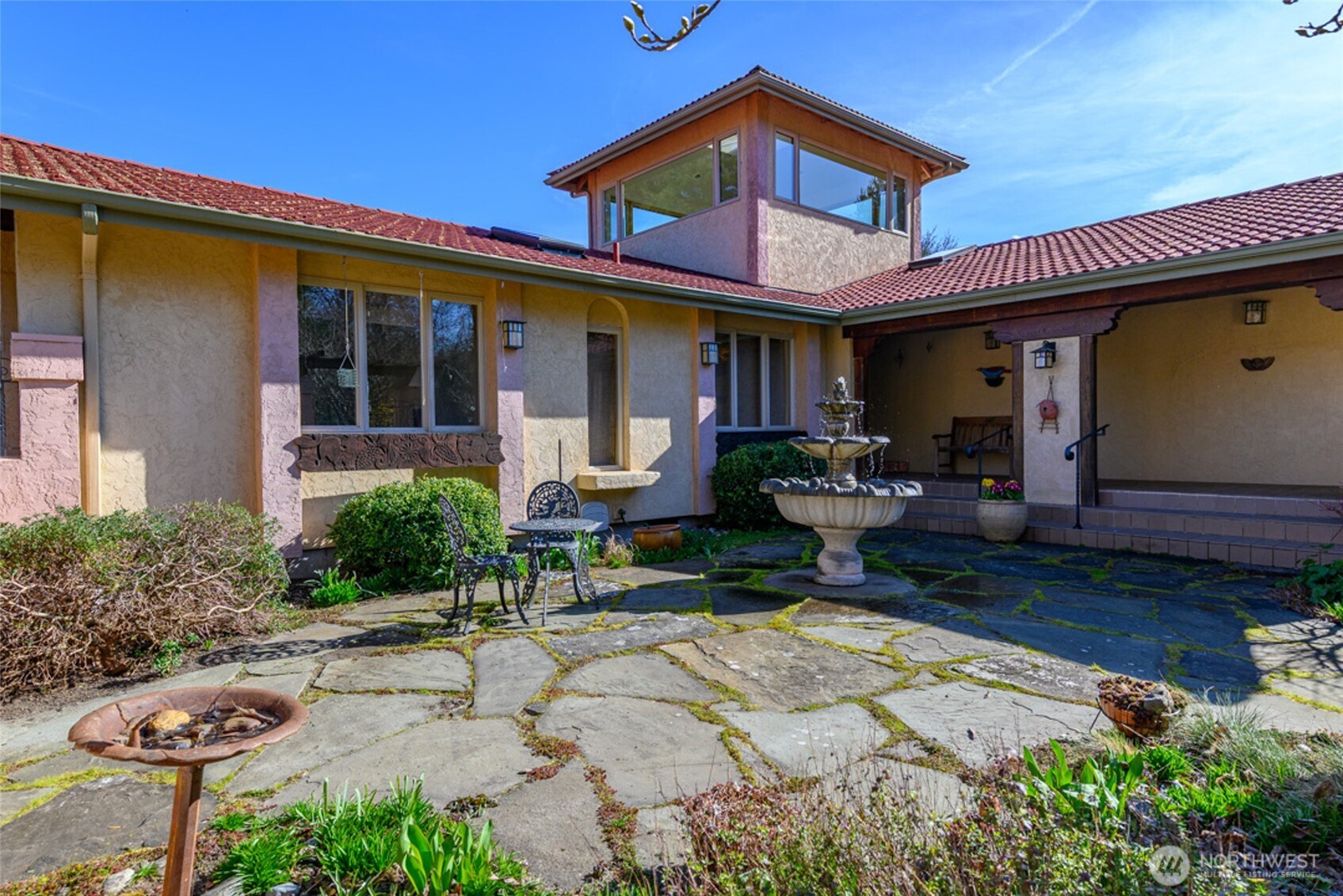 5477 Wilkinson Road Langley, WA 98260 - Photo 6 of 40 a front view of a house with sitting area