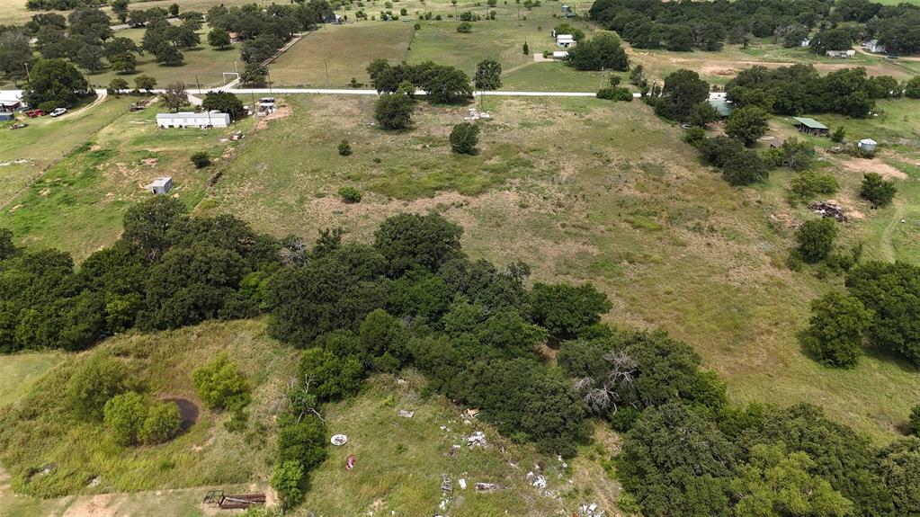 497 Big Sandy Road Newcastle, TX 76372 - Photo 14 of 22 Expansive undeveloped land featuring a mix of open grassy areas and mature trees