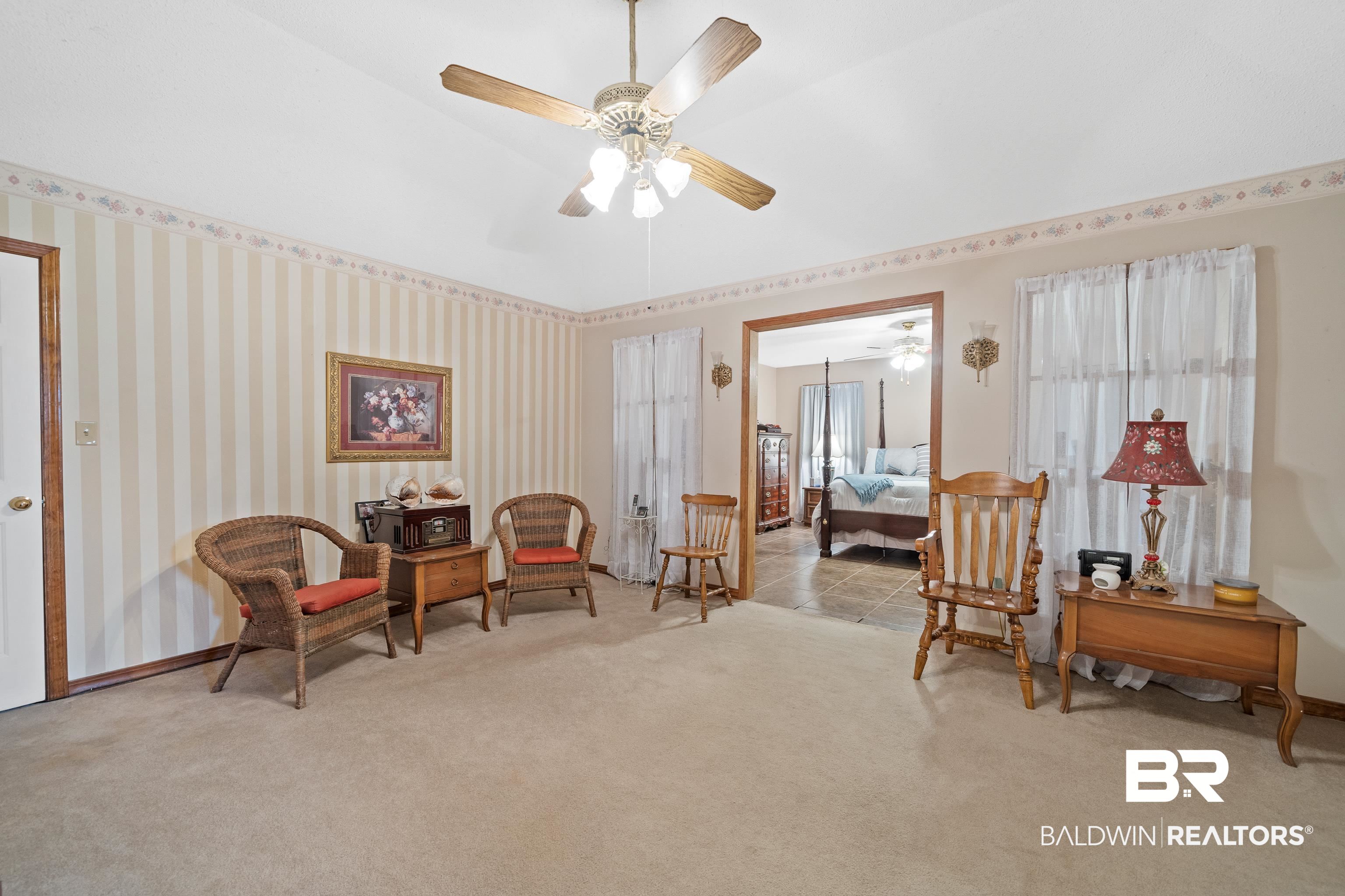 460 Ridgewood Drive Daphne, AL 36526 - Photo 15 of 31 Sitting room with ceiling fan and light colored carpet