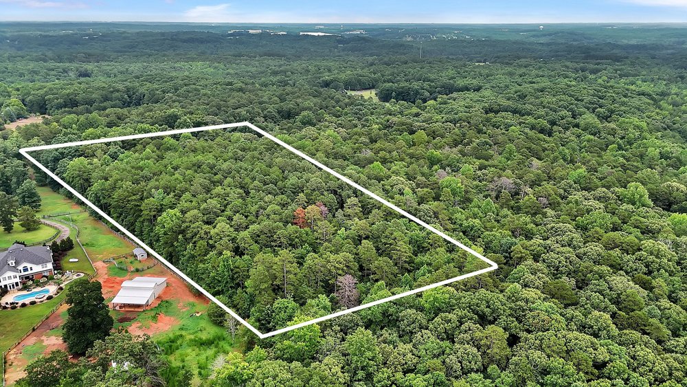 5 State Rd S-4-97 Anderson, SC 29621 - Photo 4 of 15 A vast, wooded lot provides an ideal setting for a private estate, bordered by mature trees and verdant landscapes.