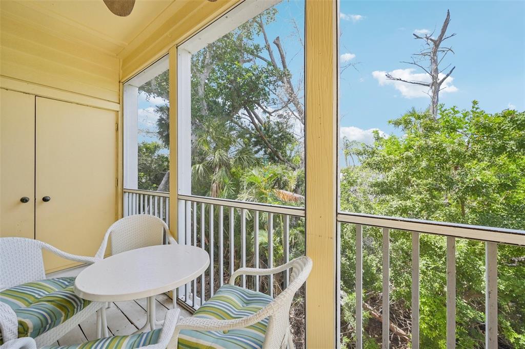 660 Cedars Court Longboat Key, FL 34228 - Photo 24 of 35 a view of a balcony with chairs
