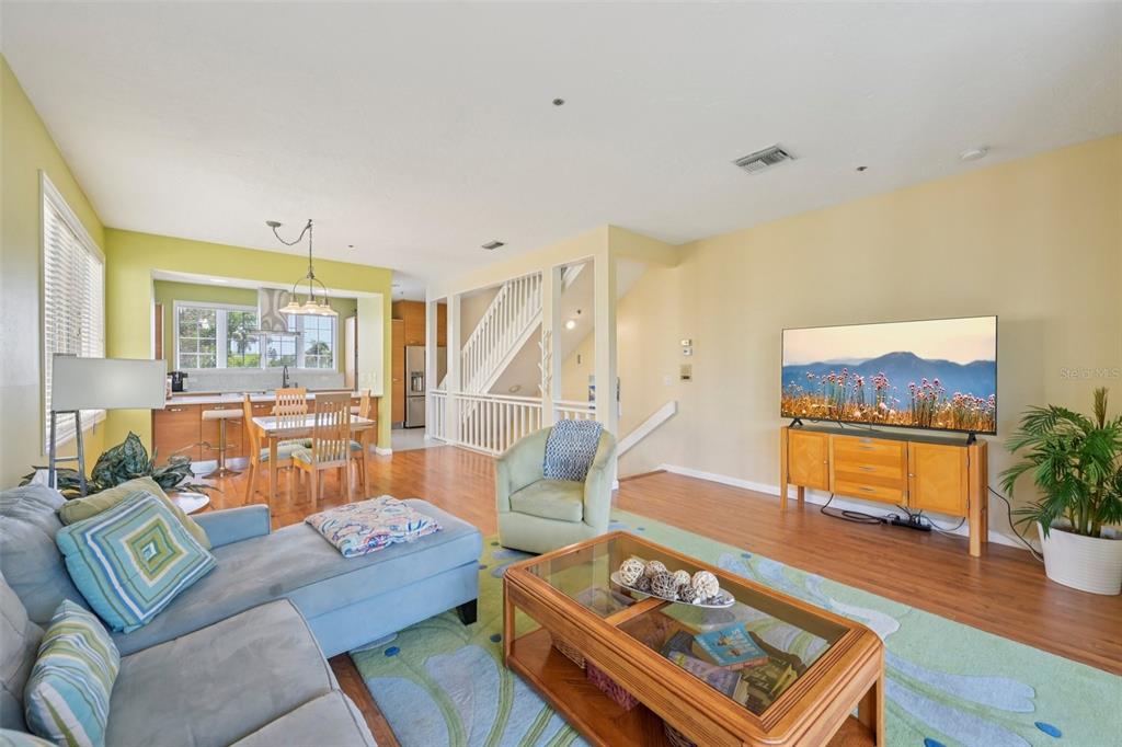660 Cedars Court Longboat Key, FL 34228 - Photo 5 of 35 a living room with furniture and a wooden floor