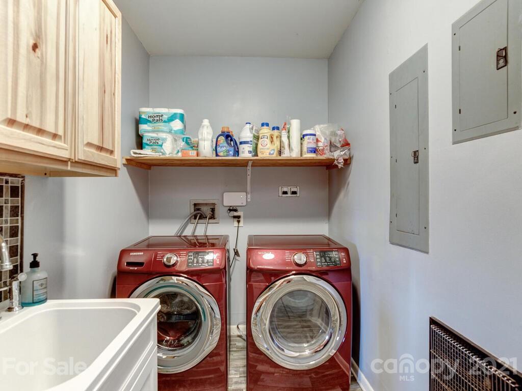 251 Riding High Road Waynesville, NC 28785 - Photo 24 of 41 a utility room with dryer and washer