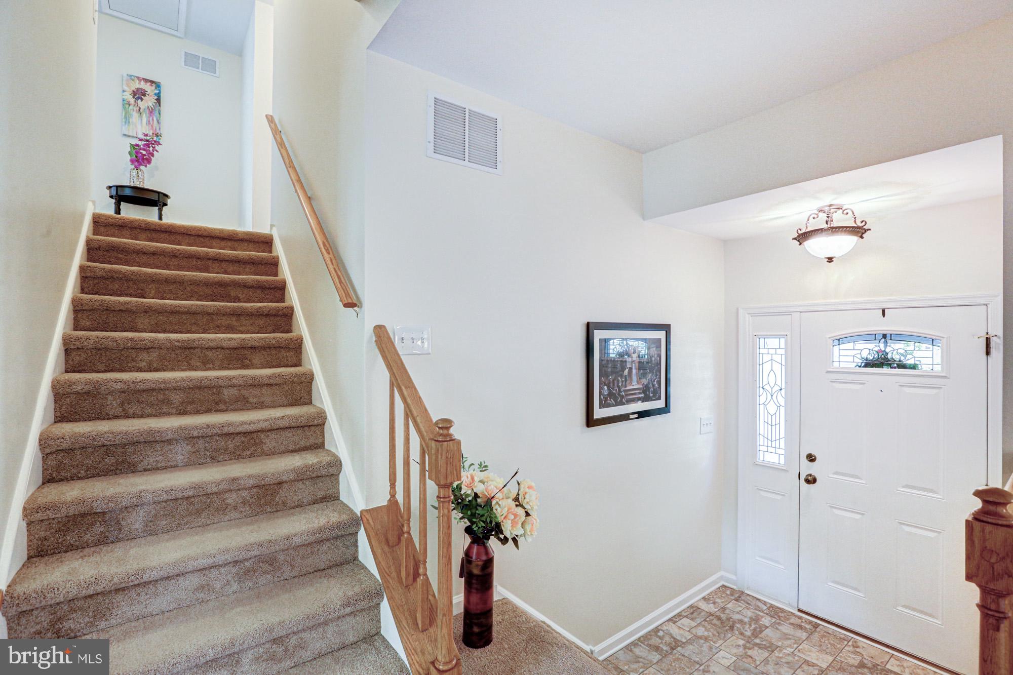 6 3 Rivers Drive Newark, DE 19702 - Photo 18 of 63 Welcoming entry with elegant staircase.