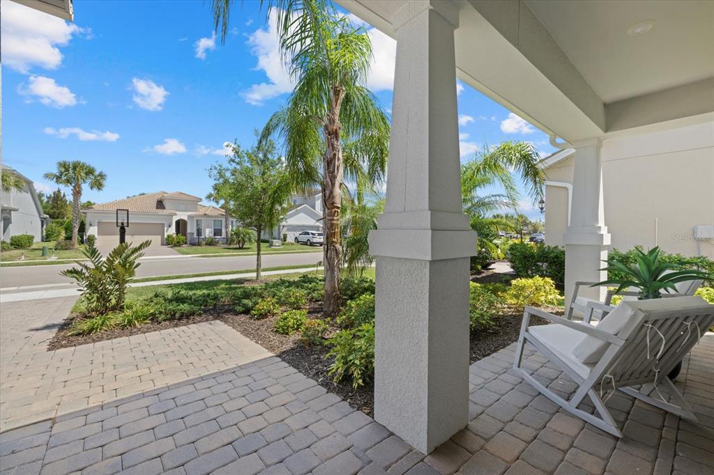 3508 Anchor Bay Trail Lakewood Ranch, FL 34211 - Photo 44 of 74 a view of a house with a yard and sitting area