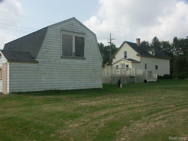 21705 29 Mile Road Ray, MI 48096 - Photo 11 of 25 Rear garage/home