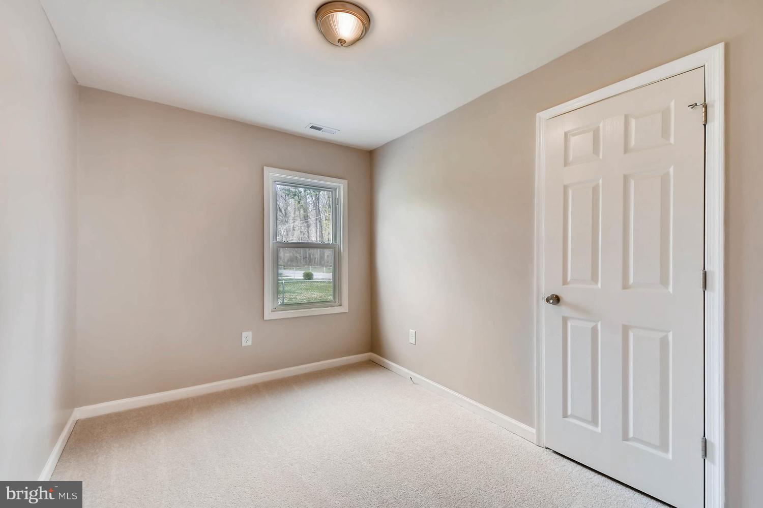 1468 Log Inn Road Annapolis, MD 21409 - Photo 15 of 28 an empty room with windows