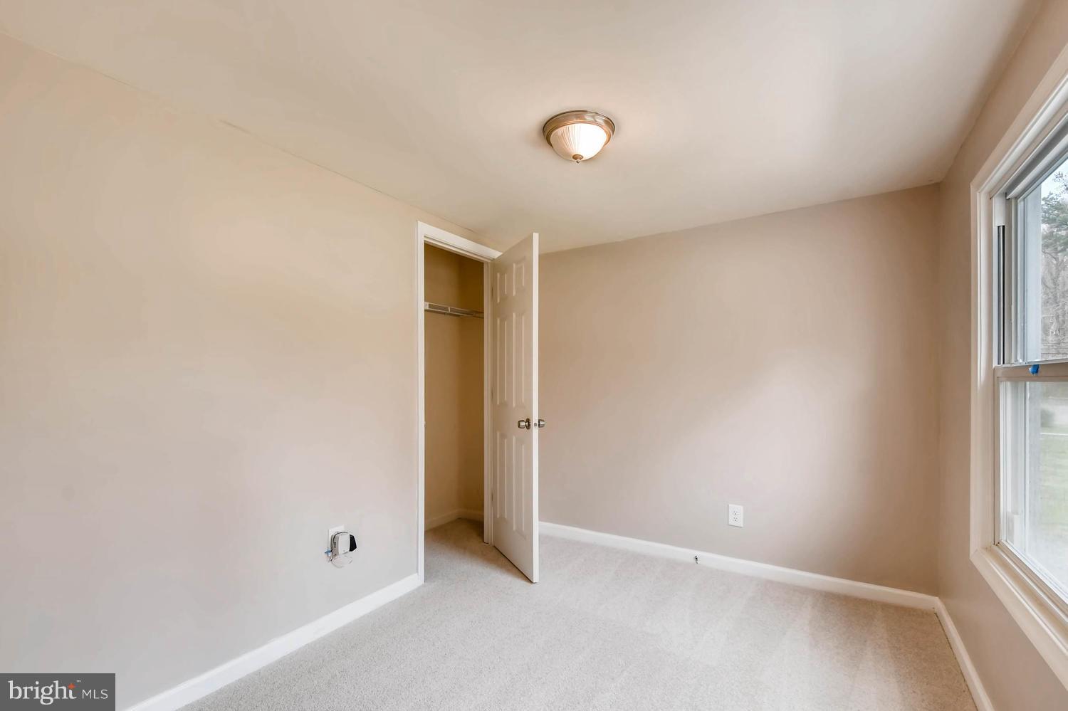 1468 Log Inn Road Annapolis, MD 21409 - Photo 17 of 28 an empty room with windows