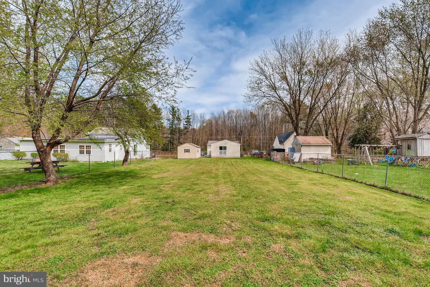 1468 Log Inn Road Annapolis, MD 21409 - Photo 24 of 28 a front view of a house with garden