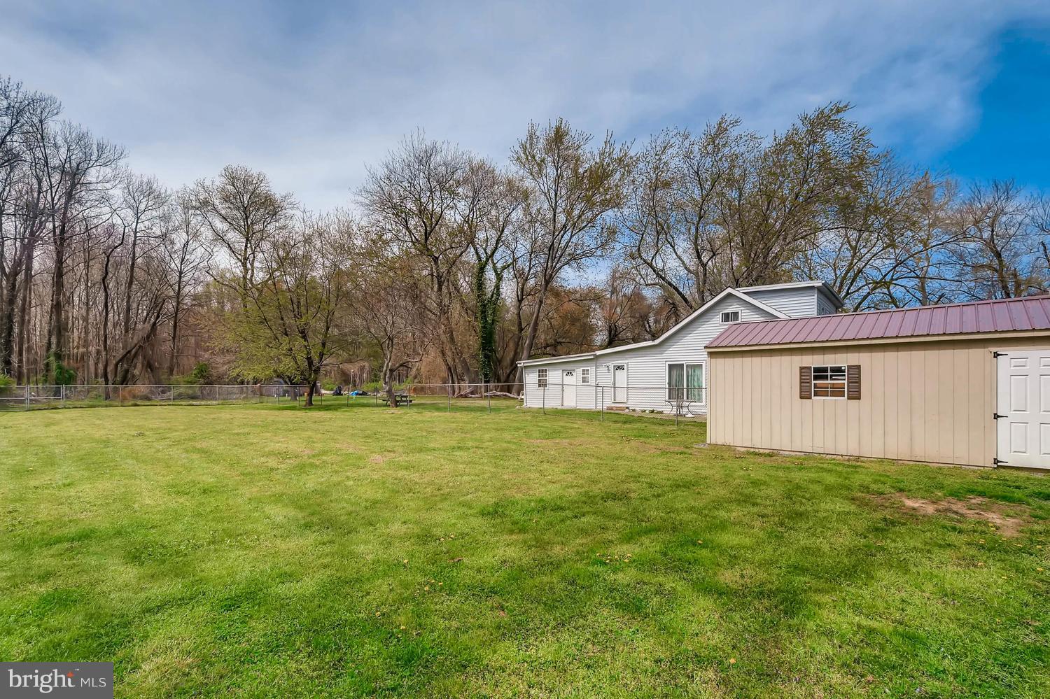 1468 Log Inn Road Annapolis, MD 21409 - Photo 25 of 28 a view of a house with a yard