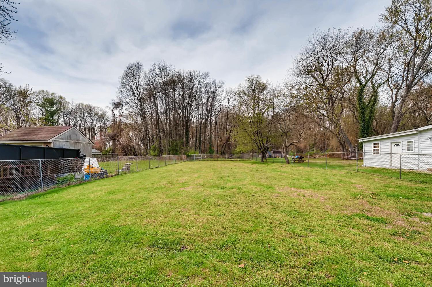1468 Log Inn Road Annapolis, MD 21409 - Photo 26 of 28 a view of a yard with a house
