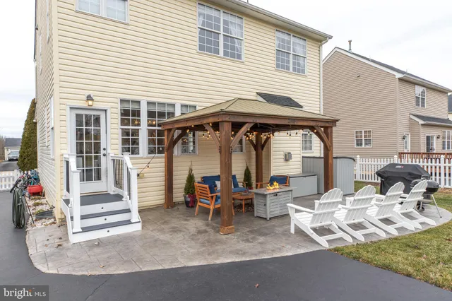 a view of a livingroom with furniture and wooden floor