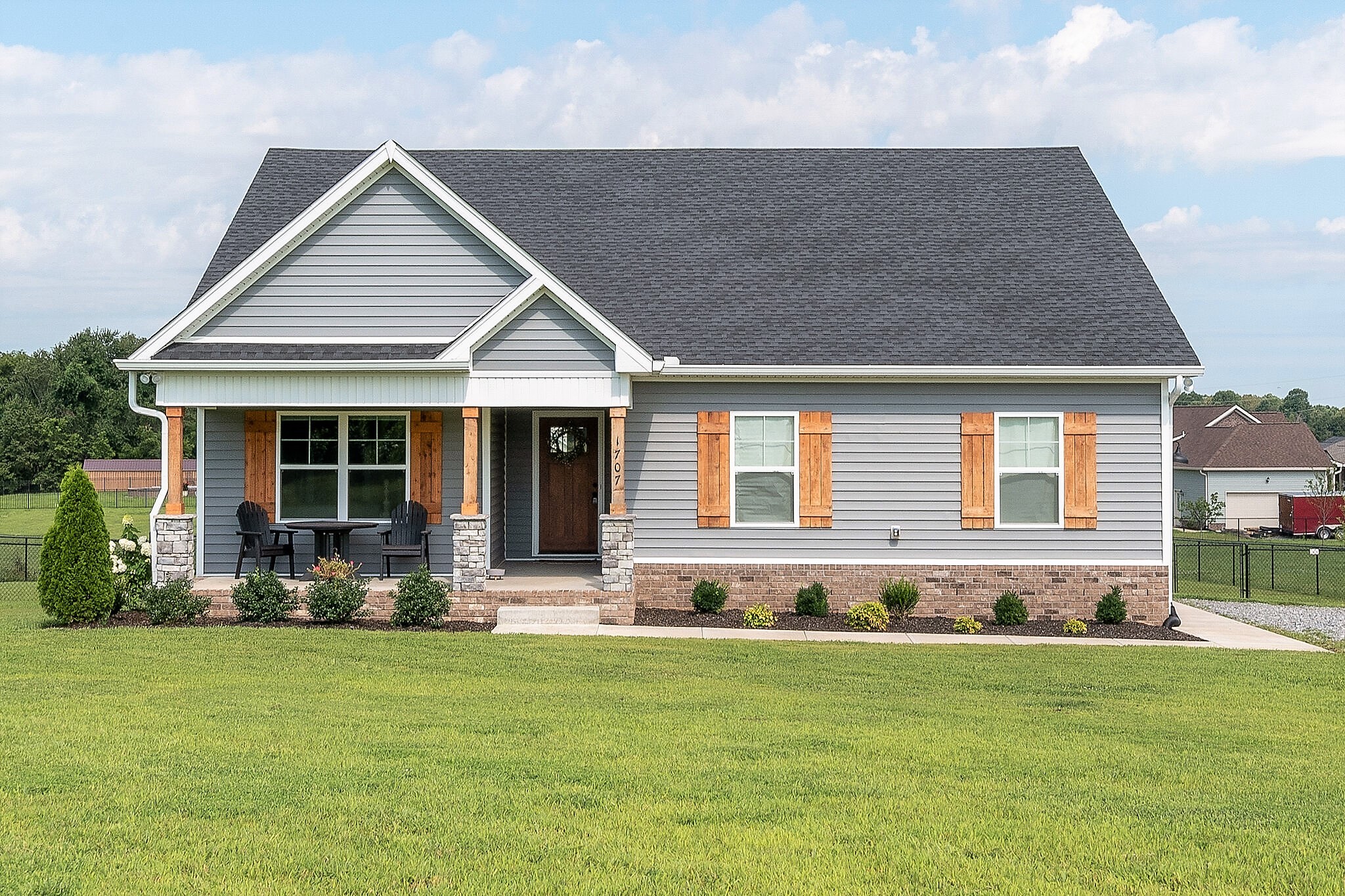 1707 Rapids Road Portland, TN 37148 - Photo 1 of 31 front view of a house with a yard