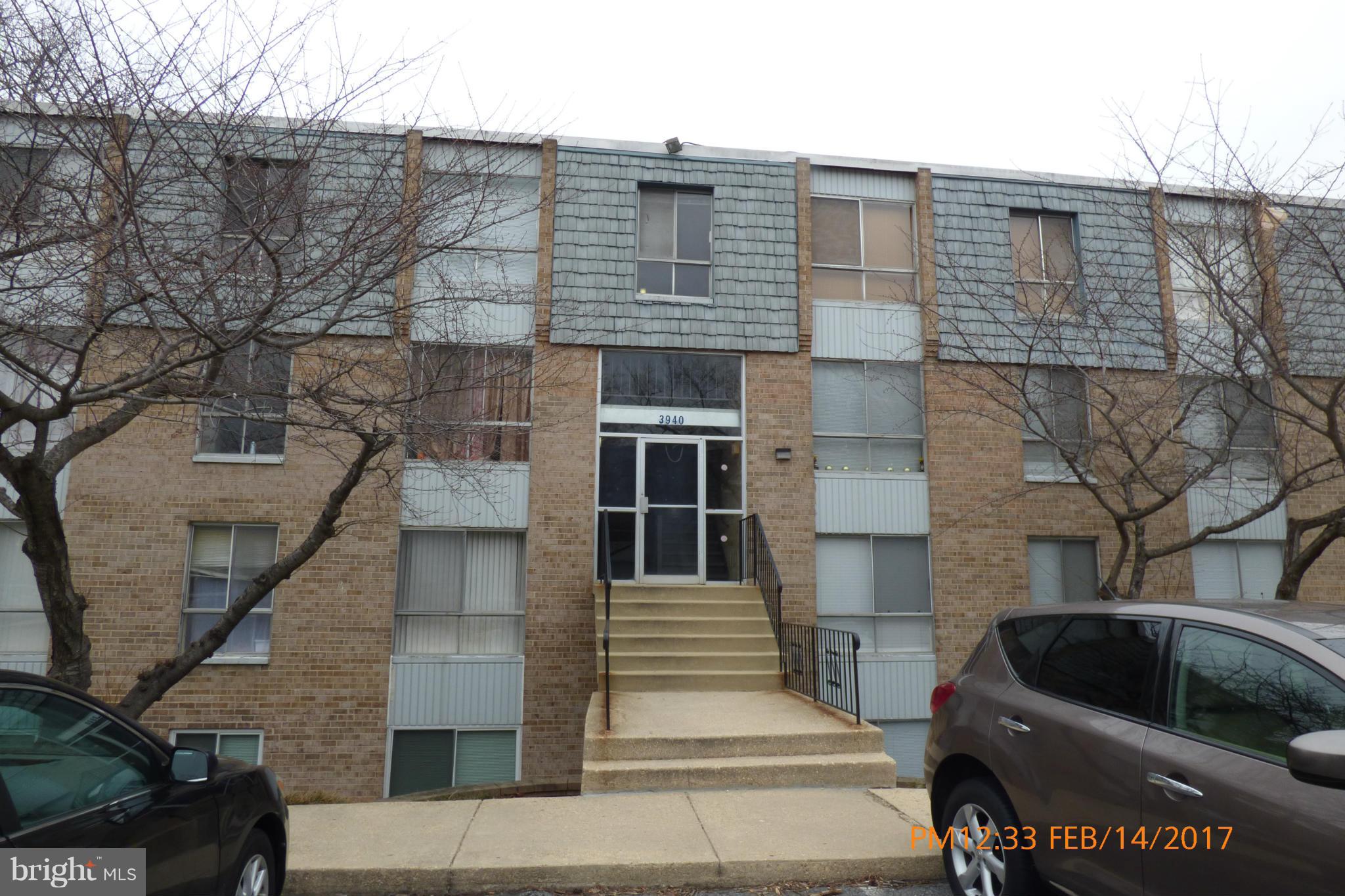 3940 Bel Pre Road, Unit 7 Silver Spring, MD 20906 - Photo 1 of 17 a front view of a house with balcony