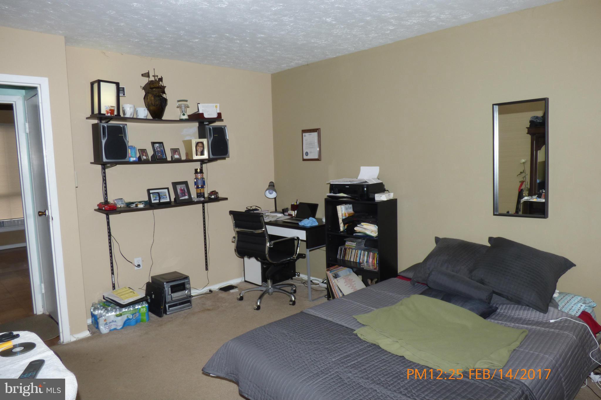3940 Bel Pre Road, Unit 7 Silver Spring, MD 20906 - Photo 12 of 17 a view of a livingroom with furniture and a couch