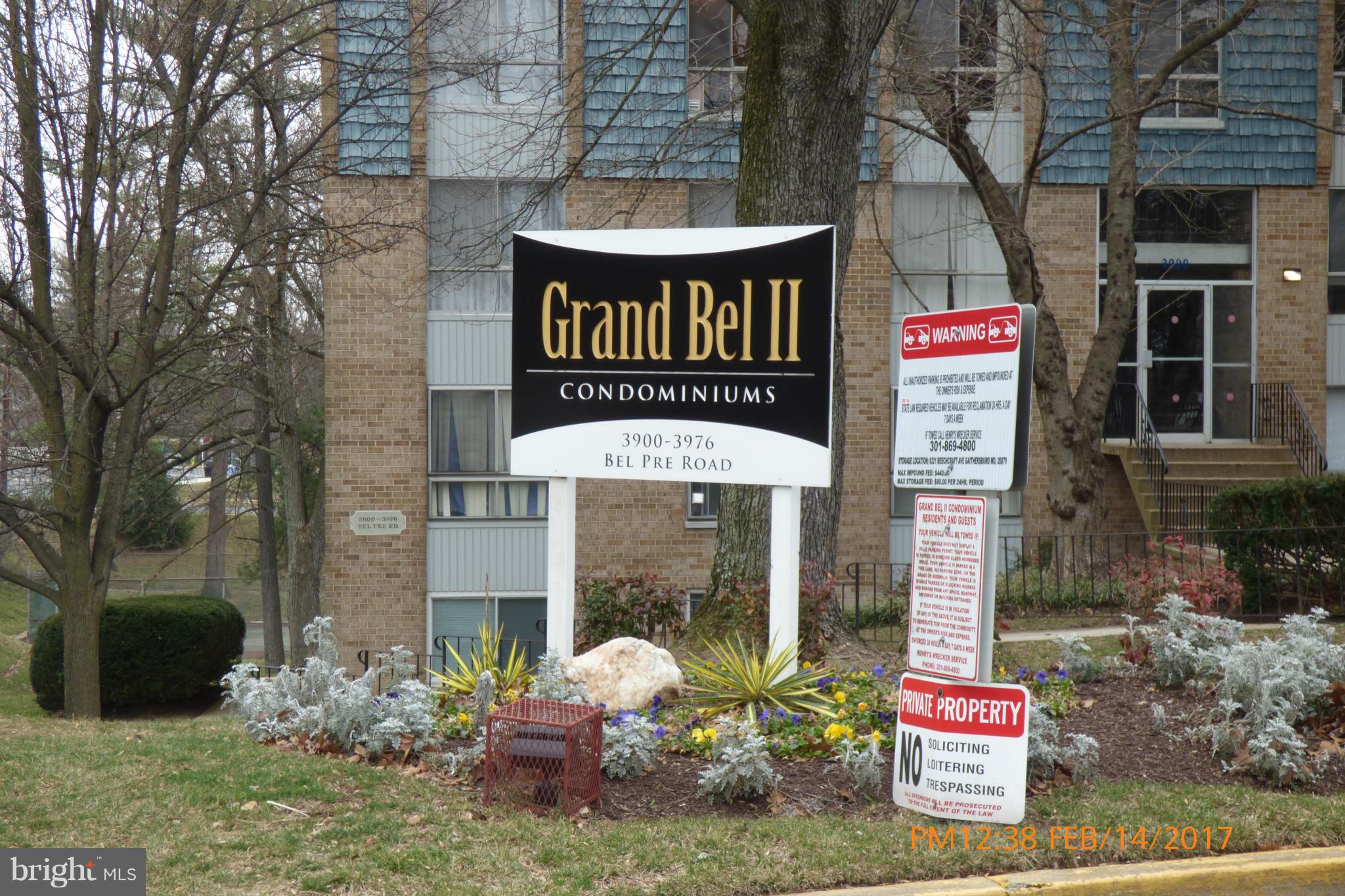 3940 Bel Pre Road, Unit 7 Silver Spring, MD 20906 - Photo 15 of 17 a front view of a house with garden