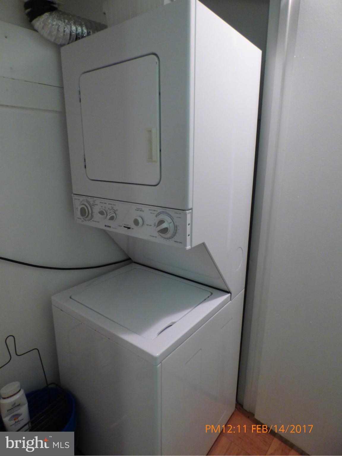 3940 Bel Pre Road, Unit 7 Silver Spring, MD 20906 - Photo 4 of 17 a utility room with dryer and washer