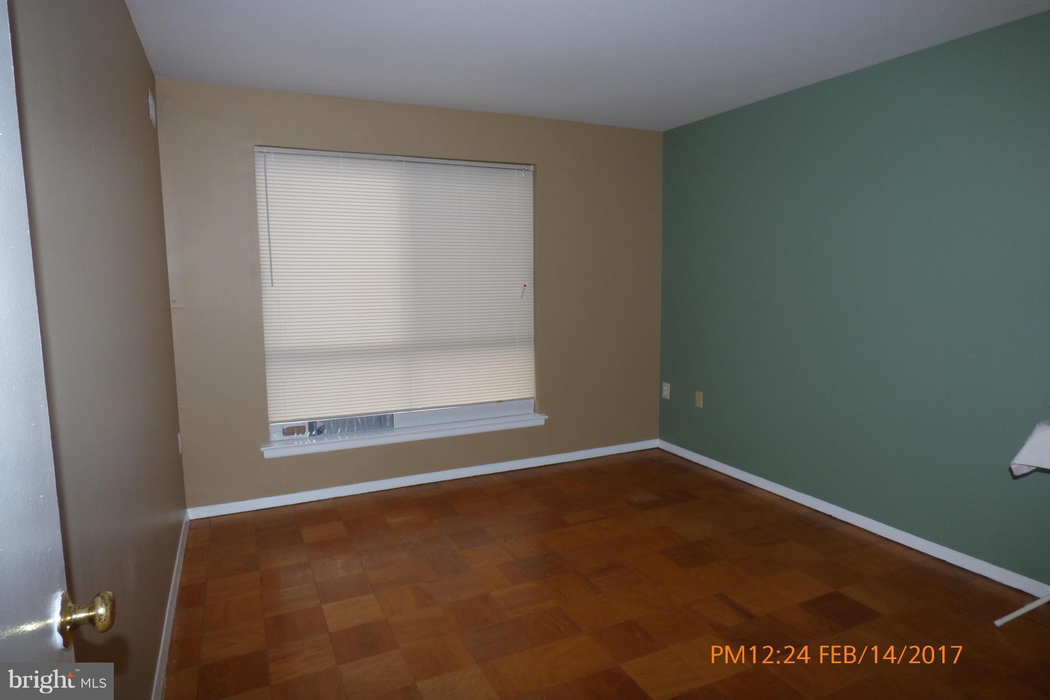 3940 Bel Pre Road, Unit 7 Silver Spring, MD 20906 - Photo 10 of 17 an empty room with a window