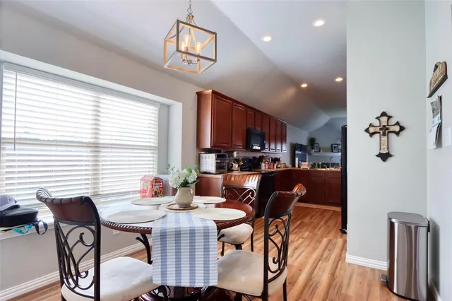 a view of a dining room with furniture