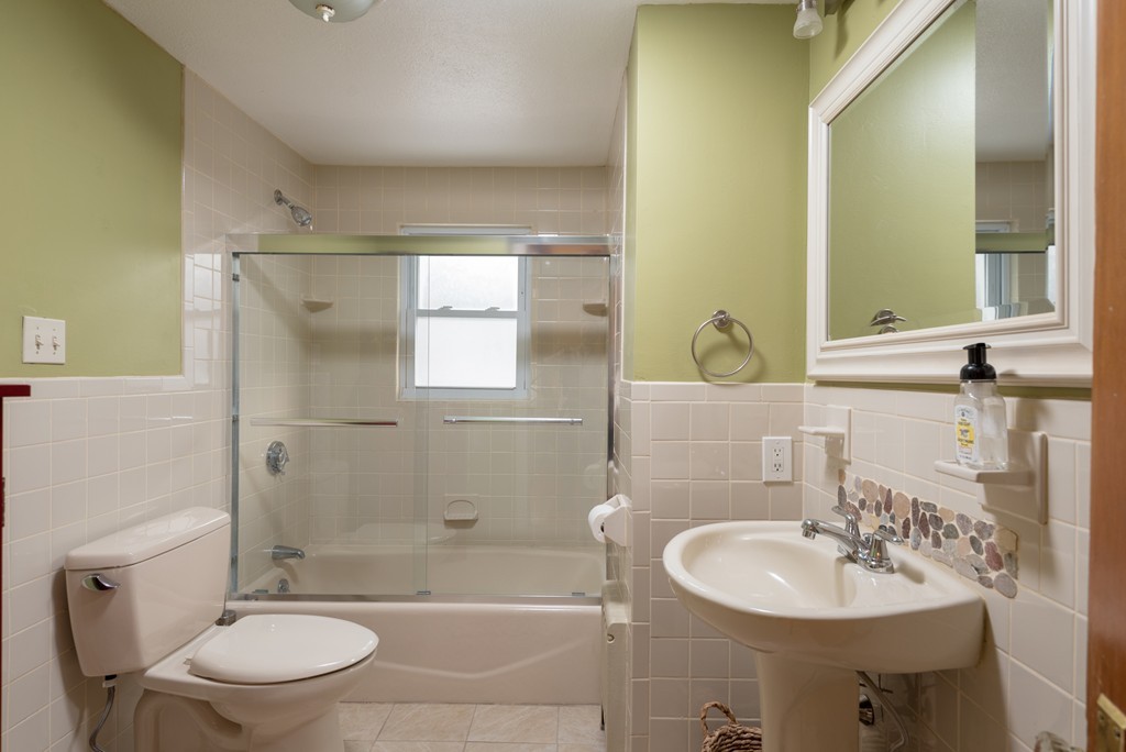 88 Manatee Road Hingham, MA 02043 - Photo 14 of 21 a bathroom with a sink toilet and shower