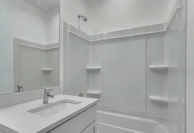 a bathroom with a sink and a bathtub